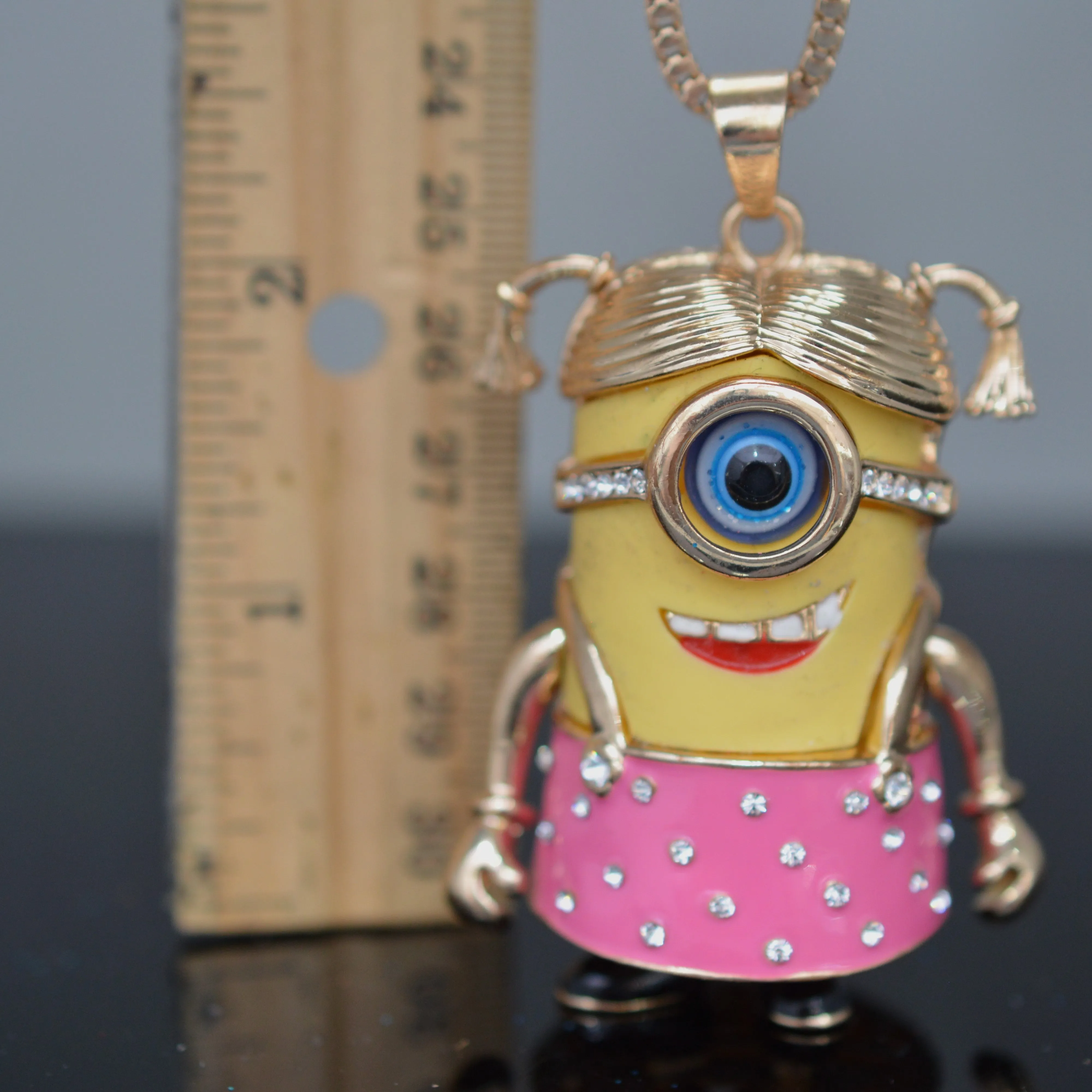 Adorable "Minion" necklace by Betsey Johnson