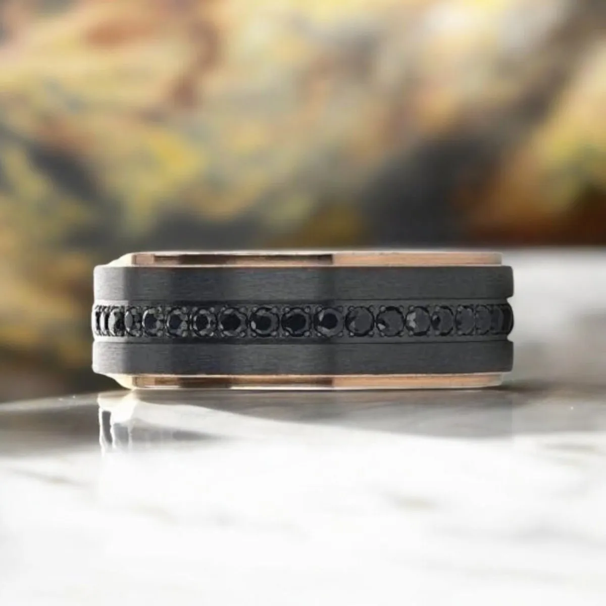 ASTRO | Black Titanium Ring, Sapphire Stones, Rose Gold Stepped Edges