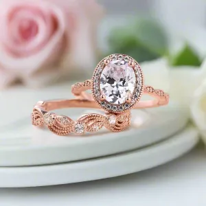 Oval Cut Clear Stone Halo Wedding Ring Set in Rose Gold