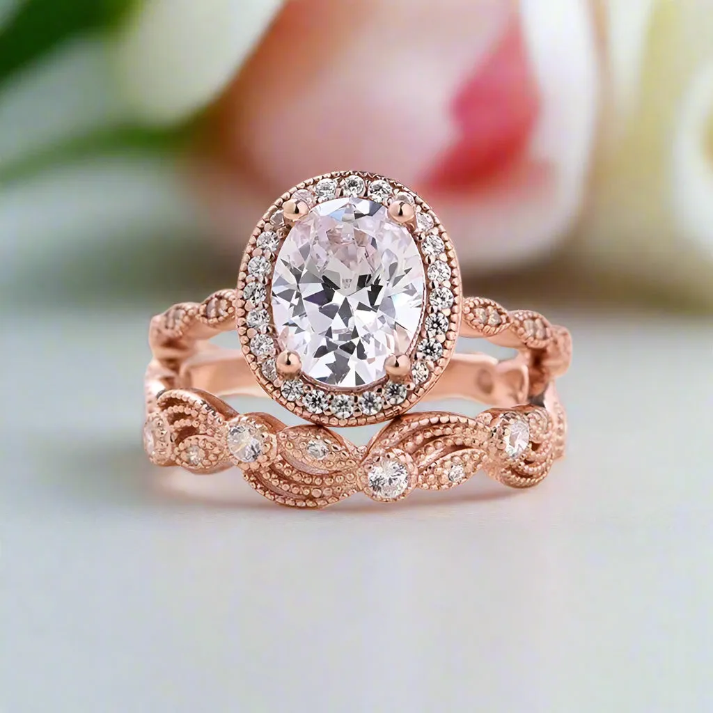 Oval Cut Clear Stone Halo Wedding Ring Set in Rose Gold