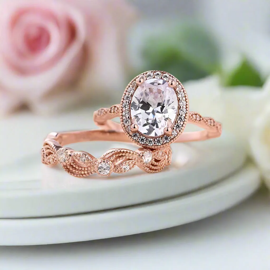 Oval Cut Clear Stone Halo Wedding Ring Set in Rose Gold
